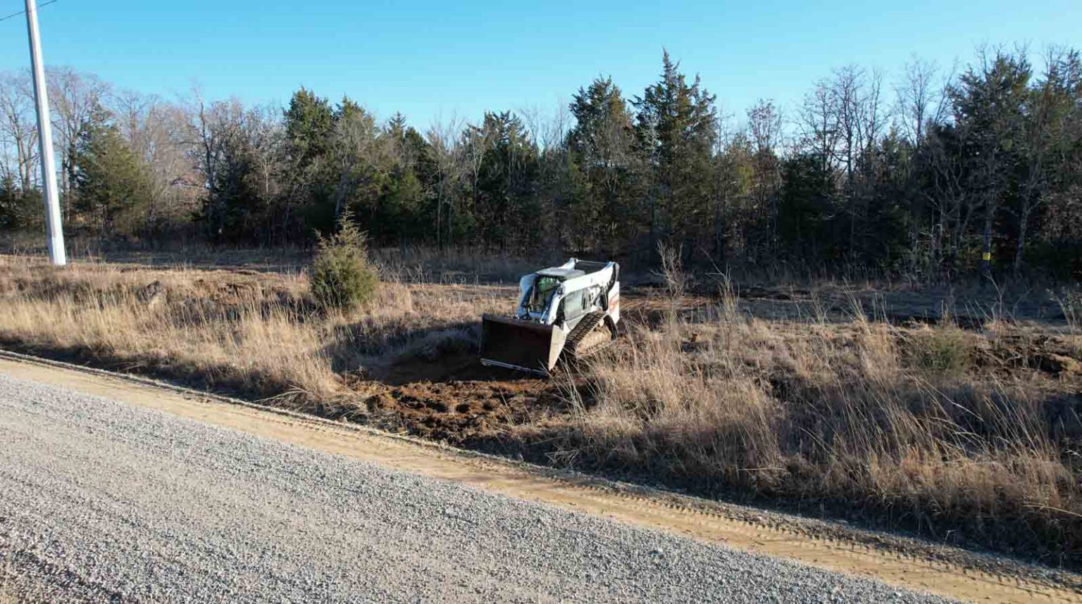 Skid Steer creating a driveway in Okemah OK